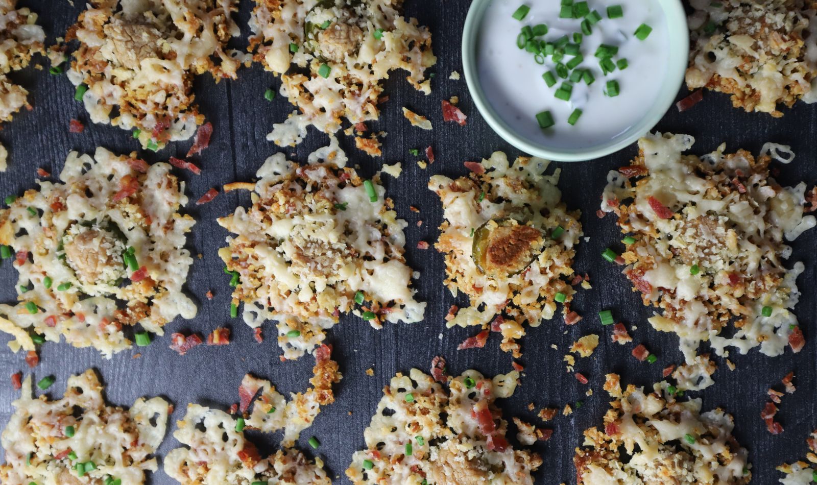 Peanut Butter Jalapeño Popper Bites arranged in lines with ranch dipping sauce